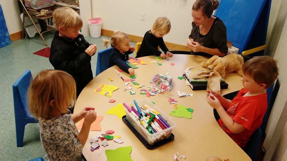Children working on crafts at Sunday School